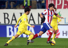 Temporada 14-15. Jornada 15. Atlético de Madrid - Villarreal. Tiago conduce el balón en carrera.
